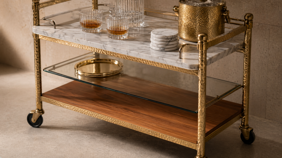 Close view of a high-end marble and hammered brass hosting cart with refined materials and styling.