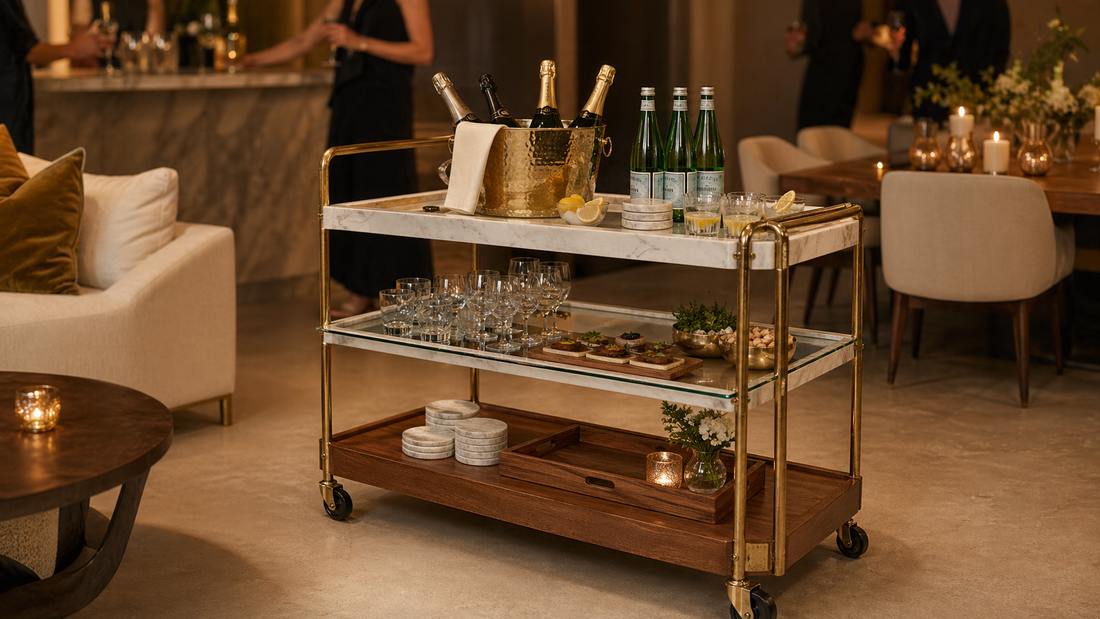 A self-serve social gathering setup with the TATPUB hosting system, brass ice bucket, teak tray, and marble coasters.
