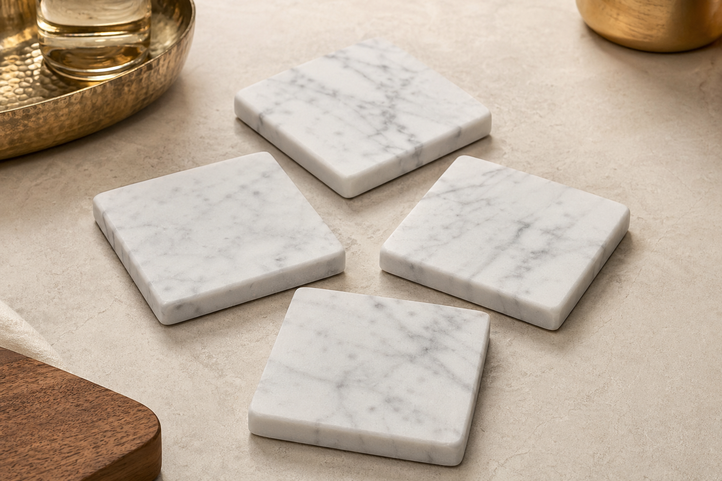 tatpub carrara coaster set 1 tatpub carrara coaster set on a marble and brass hosting surface