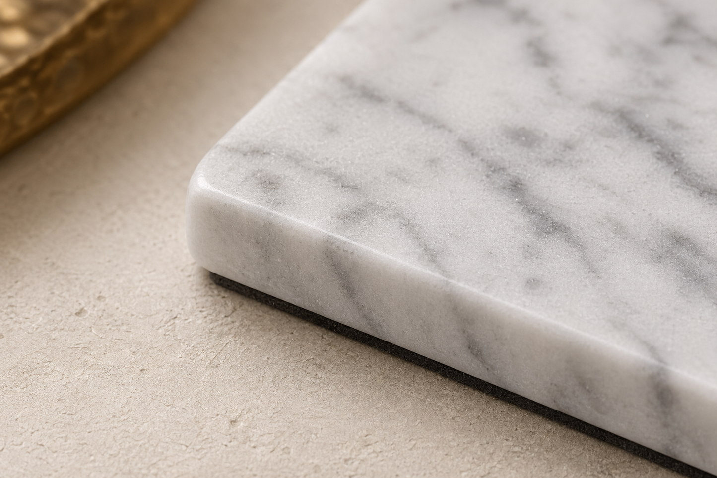 tatpub carrara coaster set 3 detail of carrara marble veining and softened coaster edge